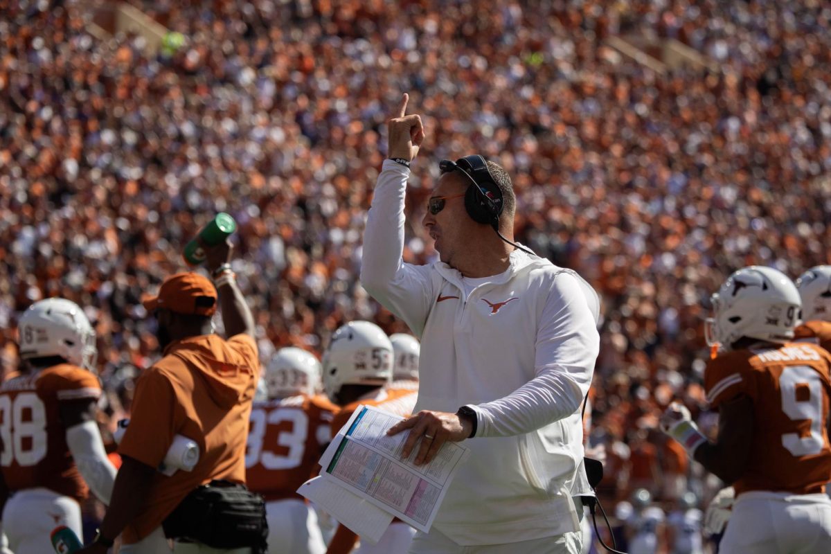 Steve Sarkisian coaches from the sidelines during the game vs Kansas State on Nov. 4, 2023.