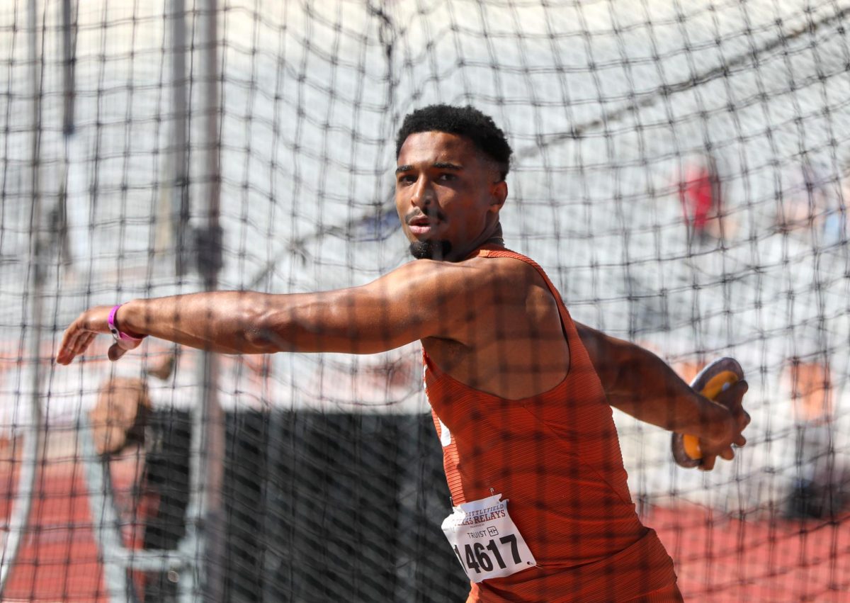 Leo Neugebauer prepares to throw a discus at Mike A. Myers Stadium on March 28, 2024.