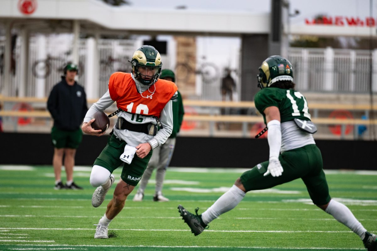 Redshirt sophomore Brayden Fowler-Nicolosi (16) runs down the field at a spring football scrimmage April 6.