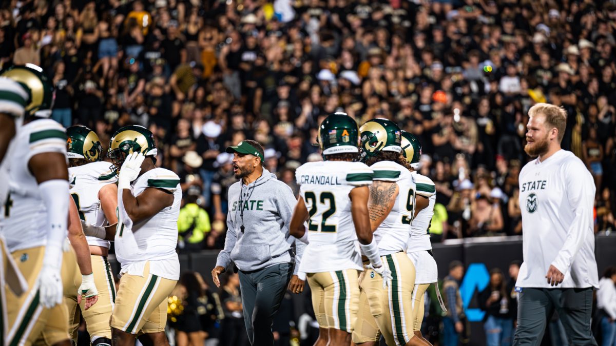 Colorado State University football coach Jay Norvell motivates his team before the Rocky Mountain Showdown game against The University of Colorado Boulder at Folsom Field in Boulder Sept. 16. CU won 43-35.