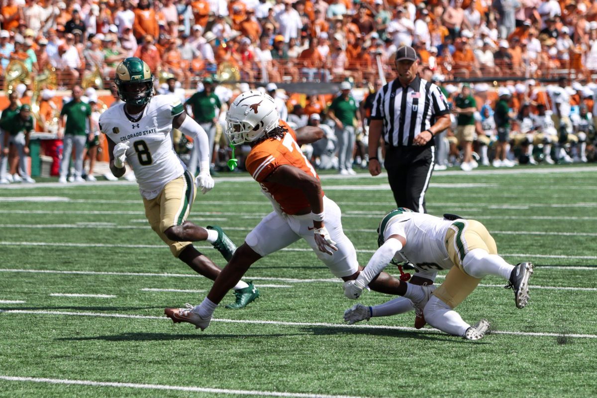 Wide receiver Isaiah Bond evades a tackle during the game against Colorado State on Saturday.