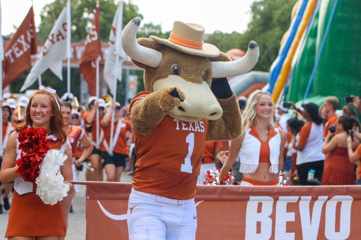 Hook 'Em walks down Bevo Blvd. during the parade held before kickoff for the Texas football game vs. Colorado State on Aug. 31, 2024.