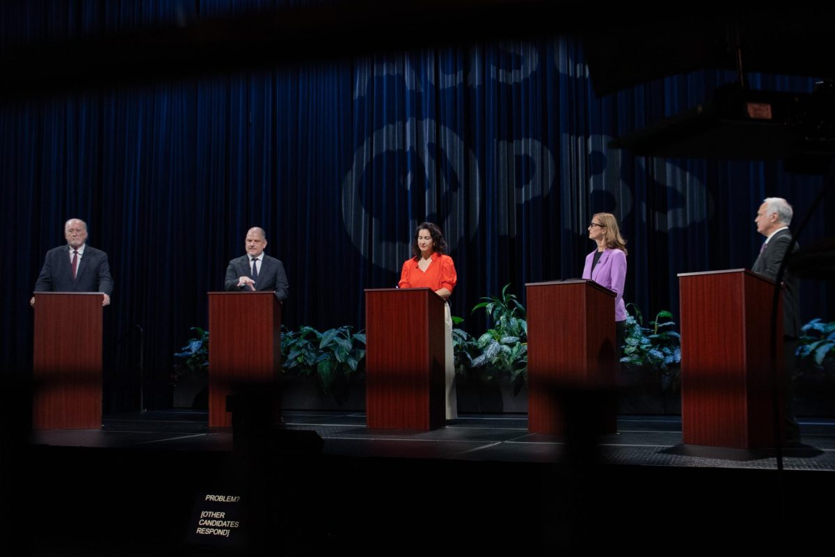 The 2024 Austin mayoral candidates listen to a question by the moderator at Austin PBS on Sept. 25, 2024. Left to right: Jeffrey Bowen, Doug Greco, Carmen Llanes Pulido, Kathie Tovo, and Mayor Kirk Watson.