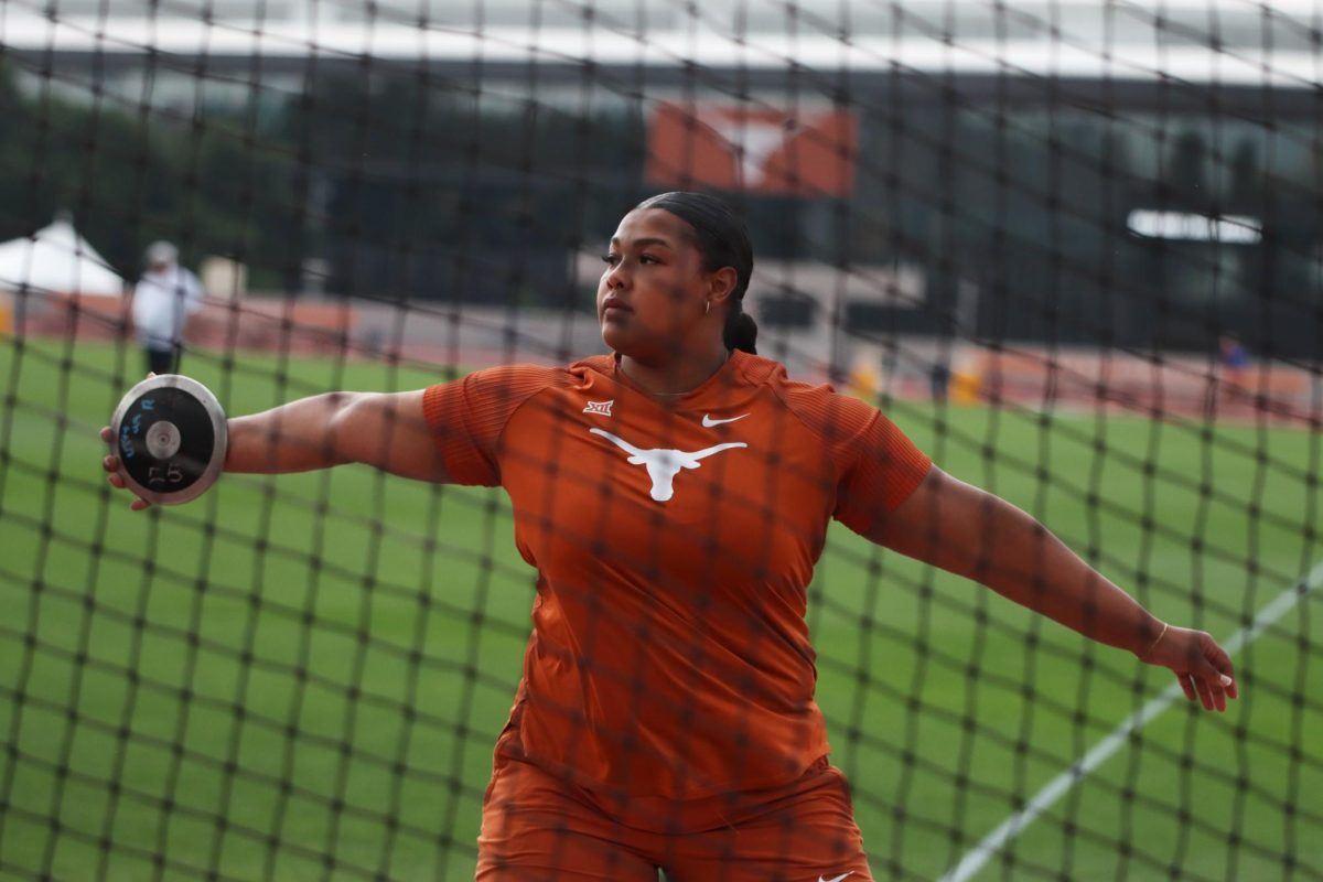 Chrystal Herpin warms up at the Texas Invitational on April 26, 2024. Herpin took second place in discus with a throw of 55.55 meters.