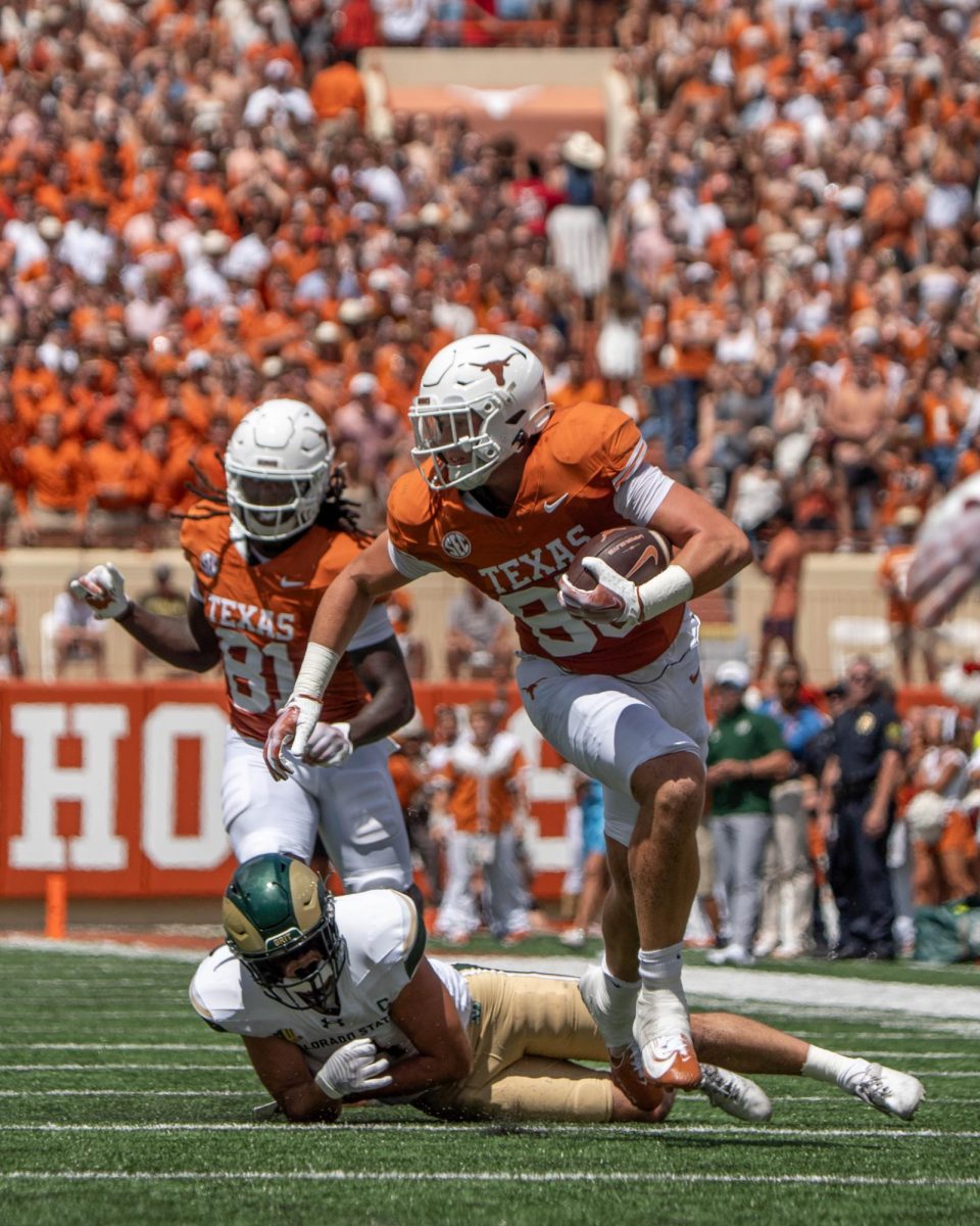 Senior tight end Gunnar Helm makes a play during Texas' game against CSU on Aug. 31, 2024. 