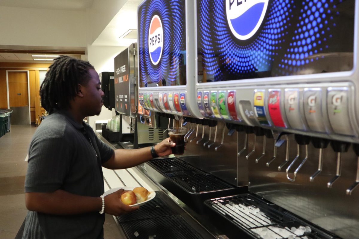 Students use the new Pepsi soda fountains at Kins Dining on Tuesday, September 10, 2024.