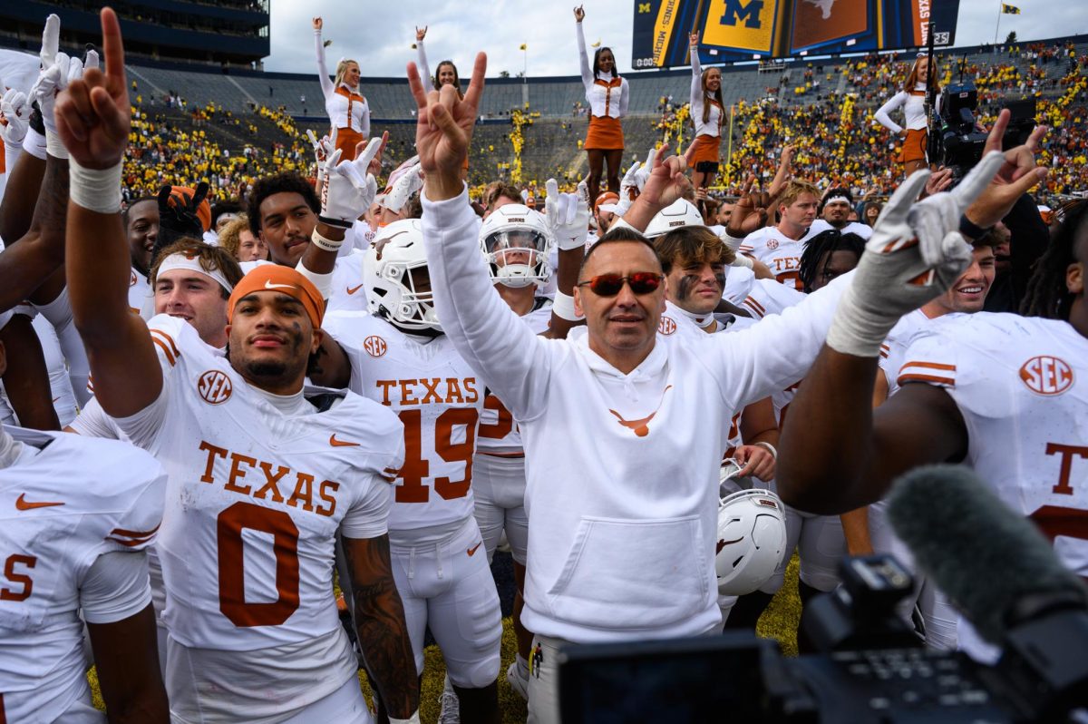 Texas coach Steve Sarkisian celebrates a win after the Texas vs. Michigan Football game at Michigan Stadium on Sept. 7, 2024.