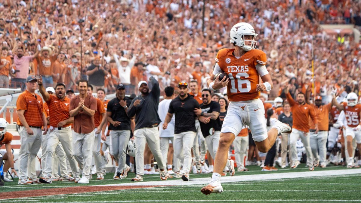 Redshirt freshman quarterback Arch Manning runs the ball downfield for a 67-yard rushing touchdown during Texas' game against UTSA on Sept. 14, 2024.