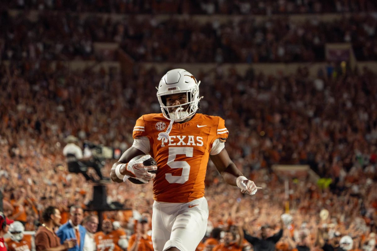 Freshman wide receiver Ryan Wingo smiles as he scores a touchdown during Texas' game against UTSA on Sept. 14, 2024. 