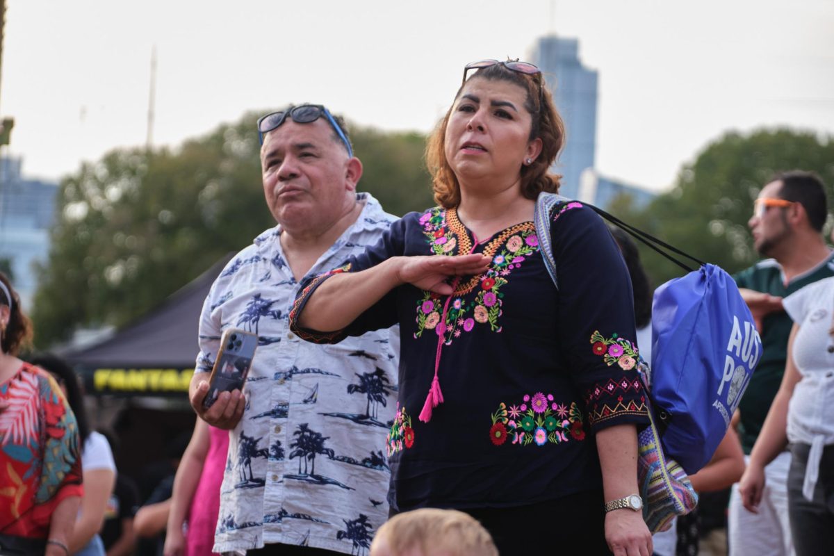 Audiences pledge during Alexandra Dorantes' performance of Mexico's National Anthem on Sept. 14 2024.