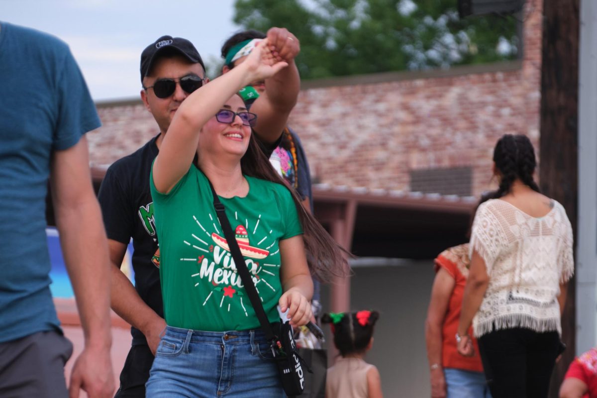 Audience enjoy performance by San Antonio band, Llamativa at Viva Mexico festival Sept. 14, 2024.