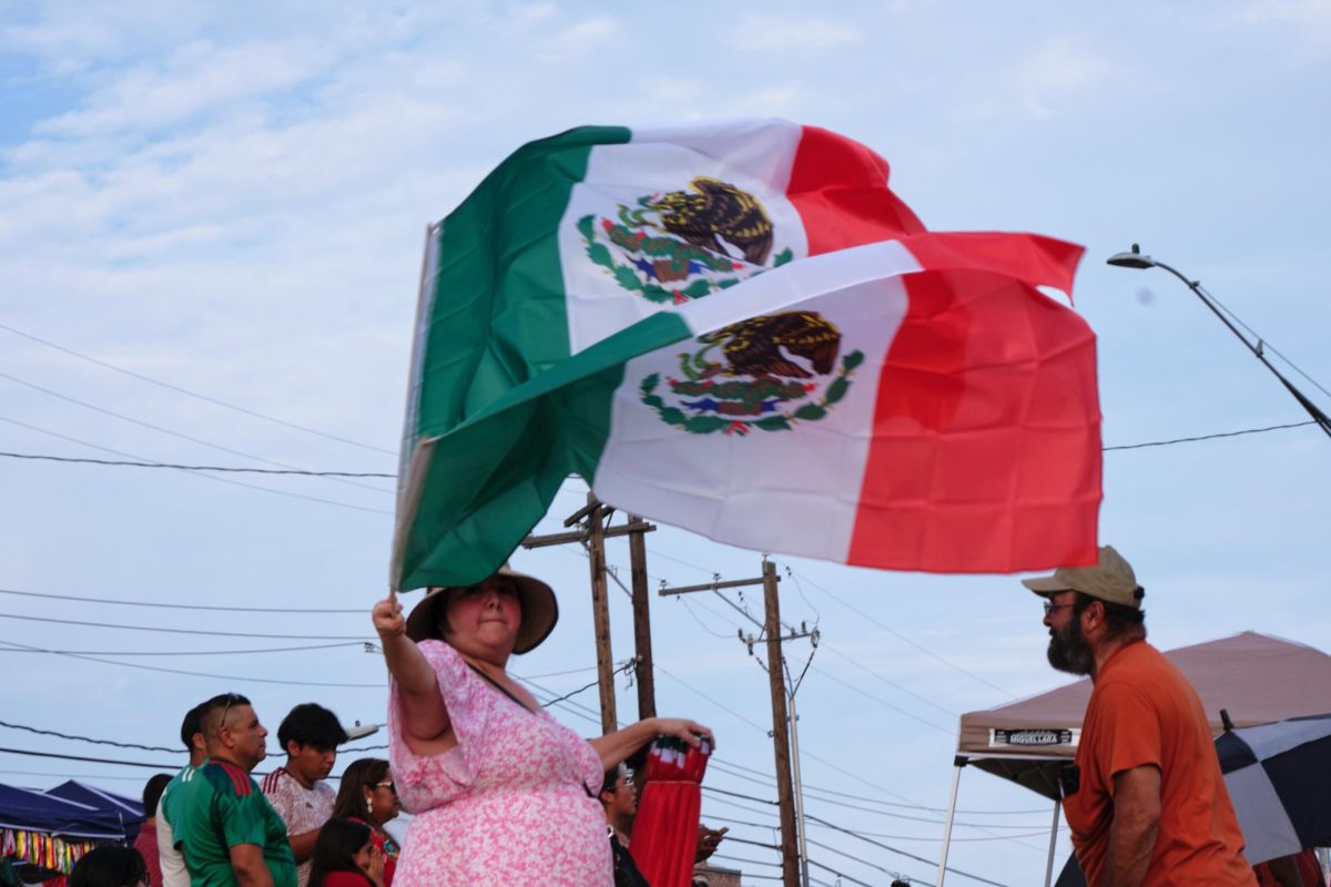 A vendor sells Mexican flags at Viva Mexico on Sept. 14, 2024.