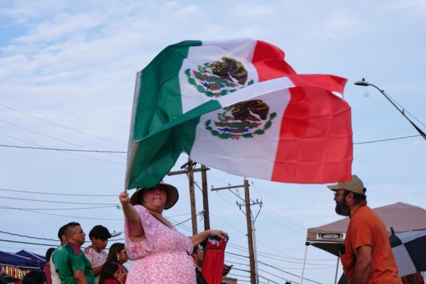 A vendor sells Mexican flags at Viva Mexico on Sept. 14, 2024.