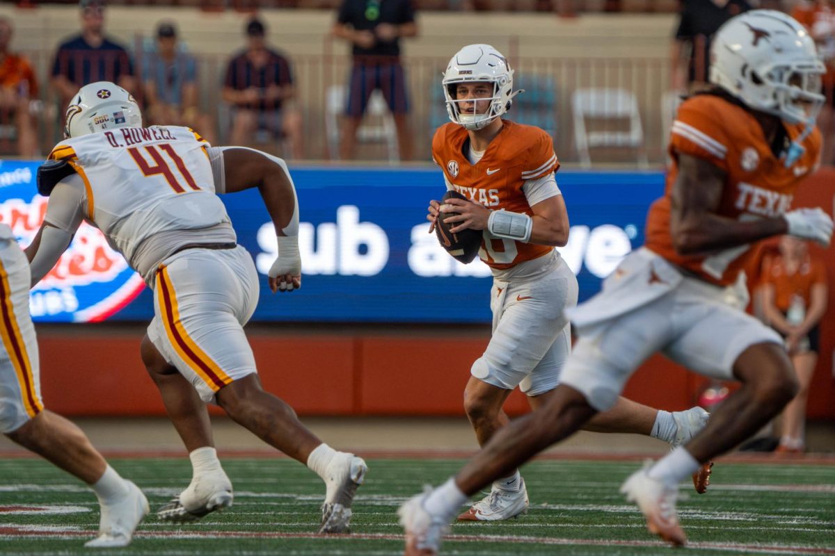 Quarterback Arch Manning looks to pass the ball during Texas' game against ULM on Sept. 21, 2024. 