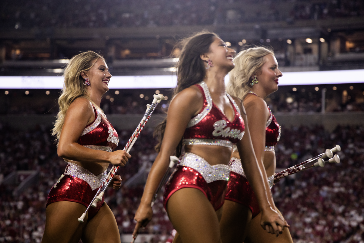 Alabama Crimsonettes exiting the field after halftime on Sept. 9, 2023. The group performs alongside the Million Dollar Band during their show. 