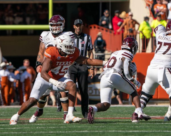 Senior defensive lineman Vernon Broughton attempts to tackle Mississippi State running back Johnnie Daniels during Texas' game against the Bulldogs on Sept. 28, 2024. 