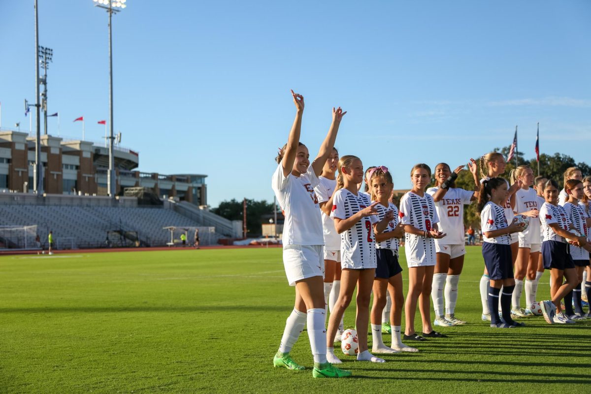 Forward Amalia Villarreal waves to the crowd during the starting lineup roll-call prior to the match against Texas A&M on Sept. 29, 2024. 