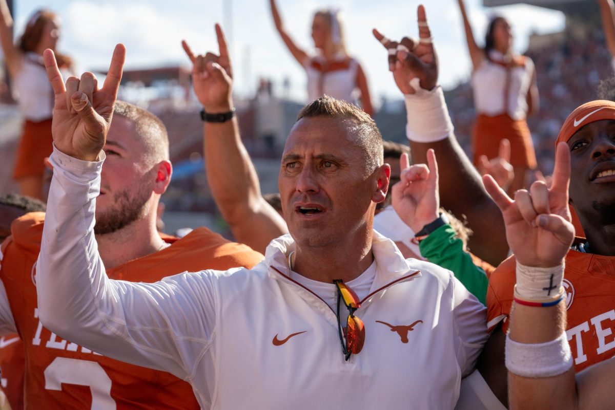 Head coach Steve Sarkisian sings "The Eyes of Texas" after the 52-0 win against CSU on Aug. 31, 2024. 