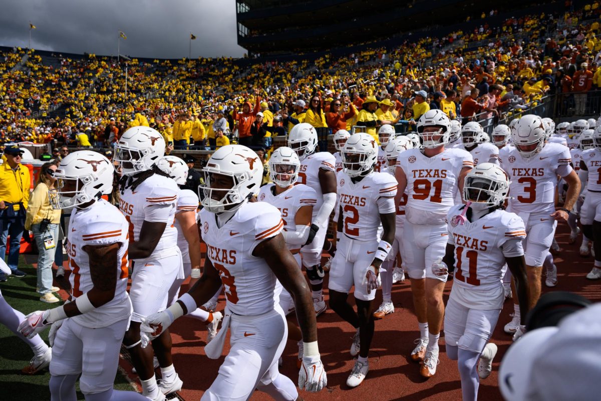 Texas Longhorns enter the stadium during the Texas vs. Michigan Football game at Michigan Stadium on Saturday.