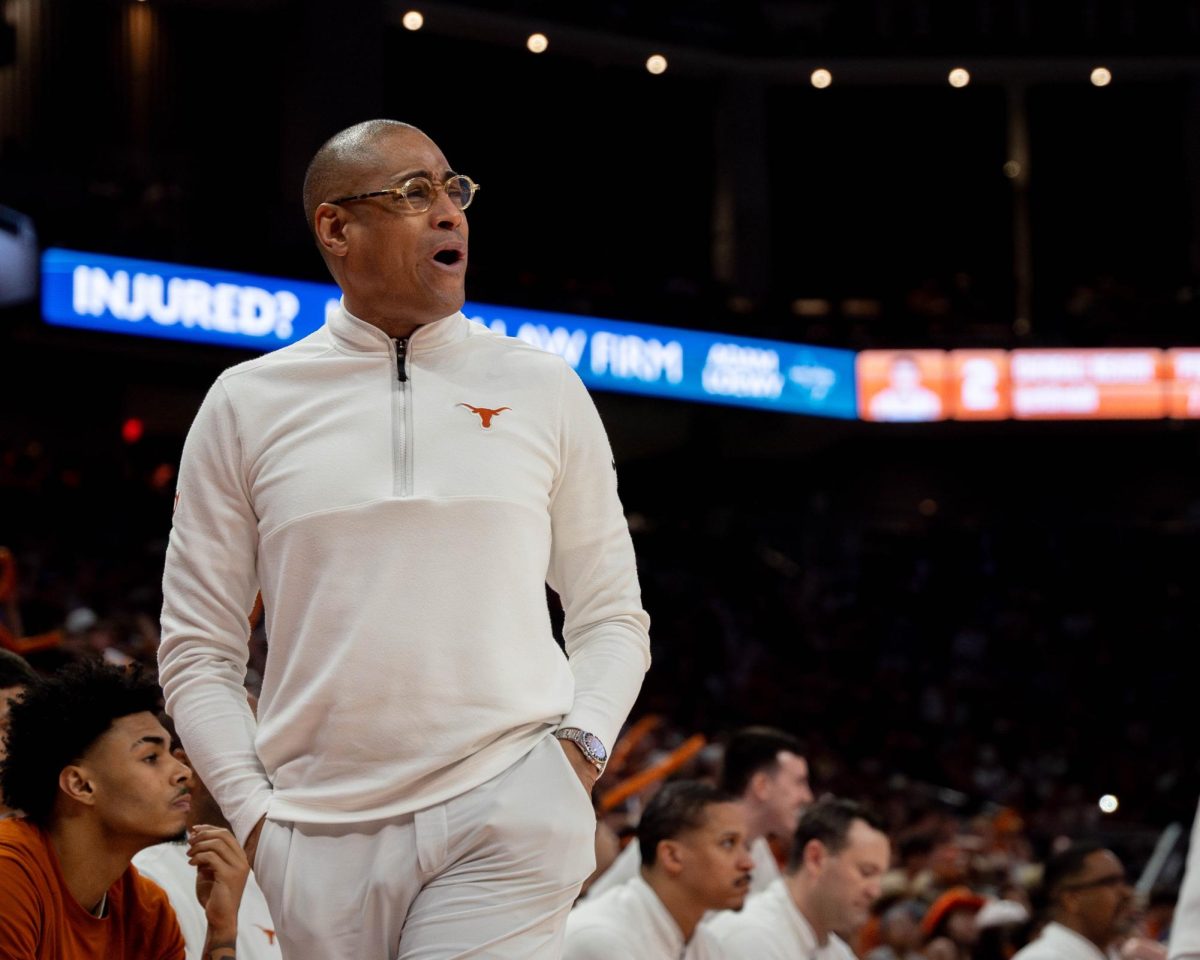 Head men's basketball coach Rodney Terry reacts to a play during Texas' game against OSU on March 2, 2024. 