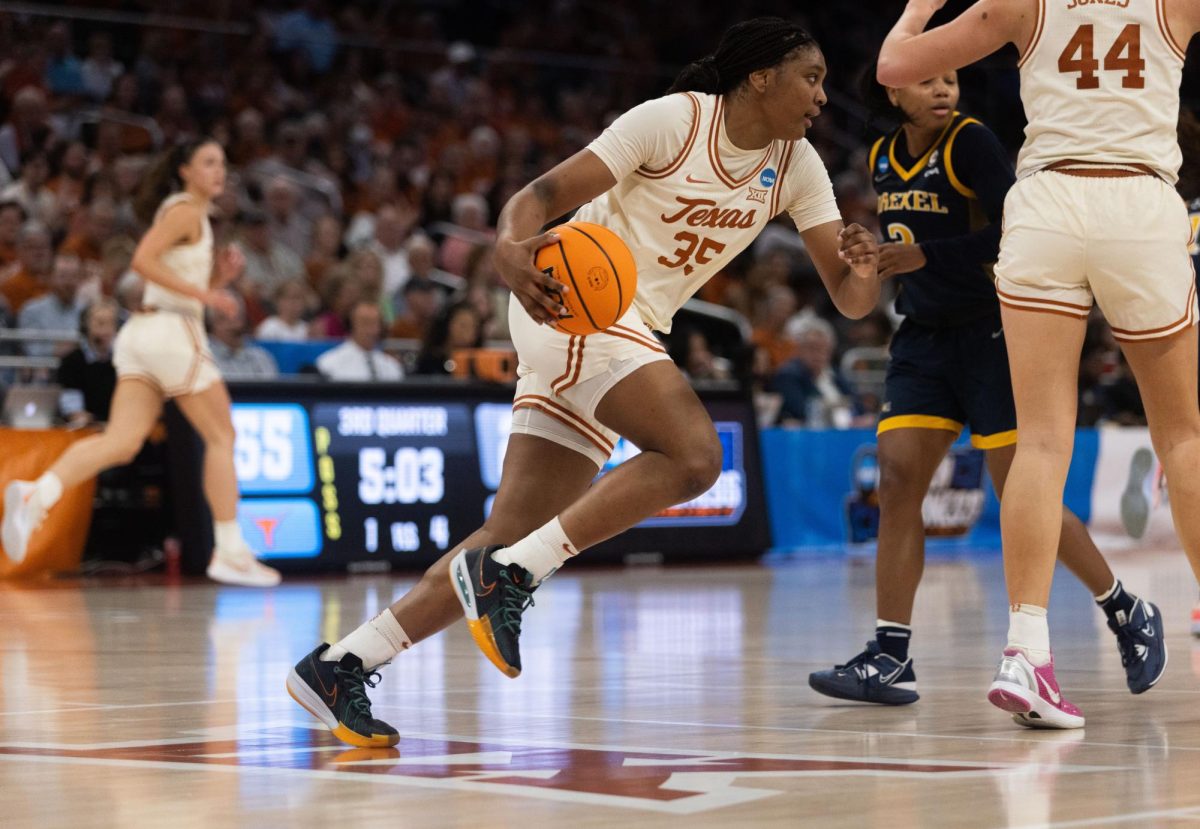 Freshman Madison Booker dribbles the ball during Texas' game against Drexel during the first round of the NCAA Women's Basketball Championship on Friday. Texas won 82-42.