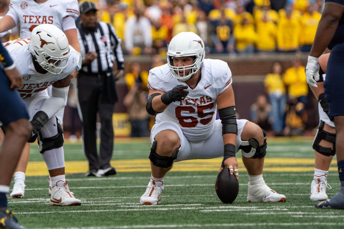 Offensive lineman Jake Majors yells at a teammate during Texas' game at Michigan on Sept. 7, 2024. 