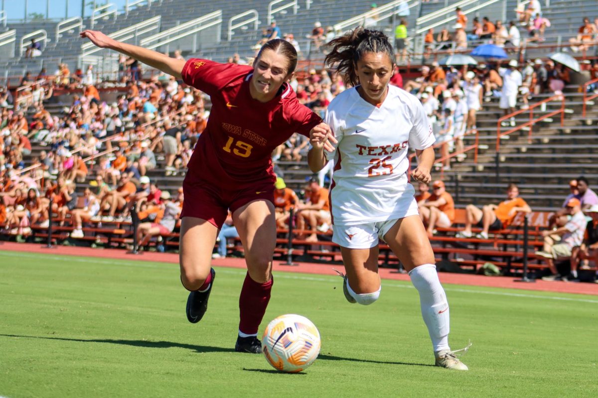 Senior defender Lauren Lapomarda blocks Iowa State forward Alex Campana from the ball on October 8, 2023.