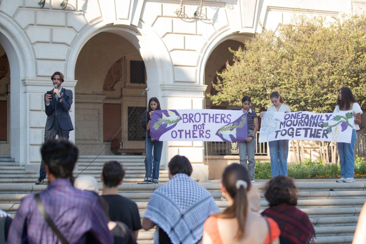 Jadd Hashem speaks outside Main Tower at Atidna’s Memorial Vigil on Oct. 13, 2024. Hashem, currently the vice president of Atidna international, will become the president next semester.