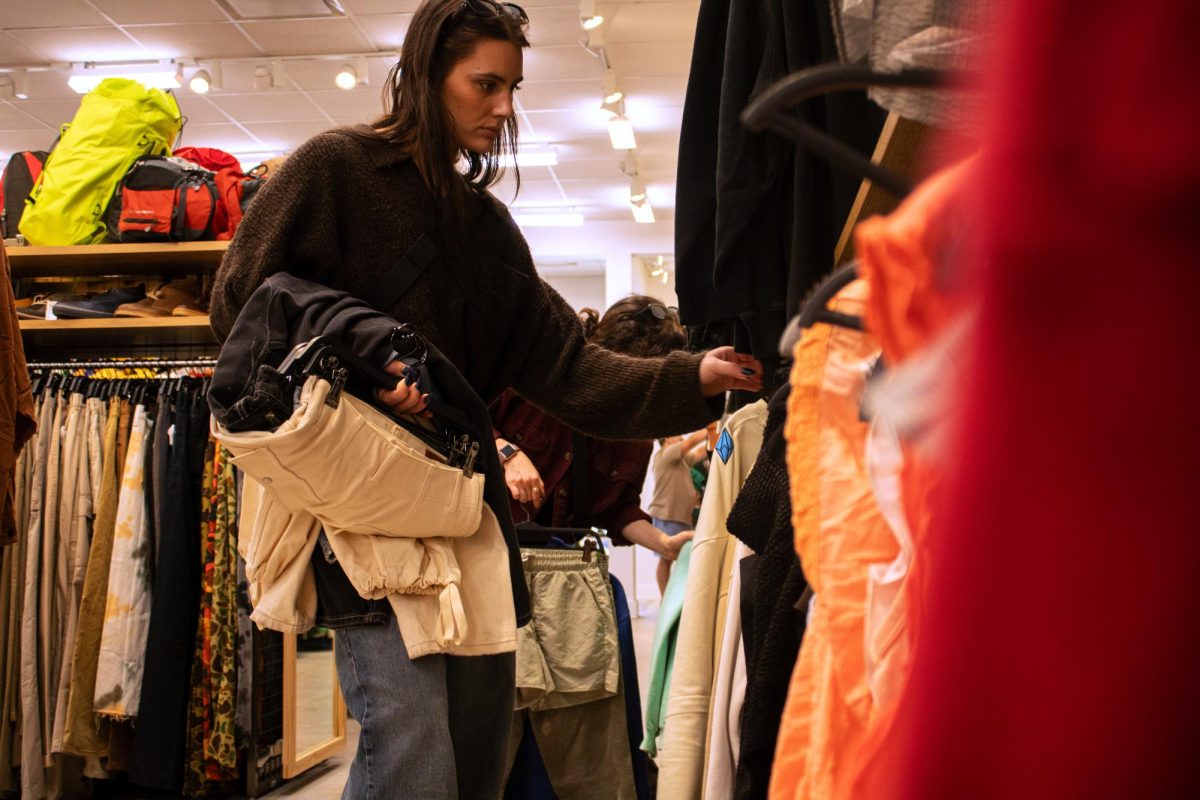 Woman looks through clothes on Oct. 12 at newly opened 2nd Street Vintage located on Guadalupe Street.