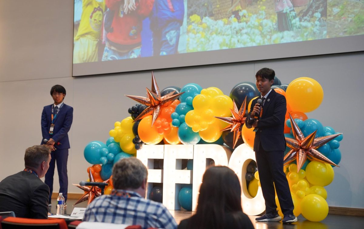 An Vo and Hieu Tran present their business during the finals of the Herb Kelleher Entrepreneurship Center's Freed Family 2024 Pitch Competition on Oct. 17, 2024.
