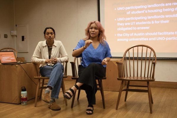 Chair and internal director Kayla Quilantang, speaks at UT Tenants' town hall event on October 17th. This event focused on receiving student feedback on housing. Namratha Thrikutam, chair-elect and external outreach director, is sitting alongside her.