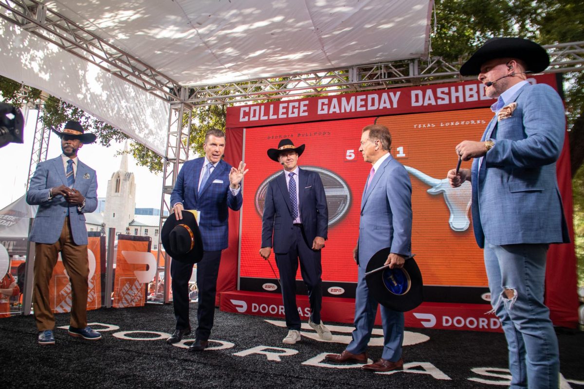 Rece Davis, second from left, talks about the upcoming football game between Georgia and Texas outside South Mall on Oct. 19, 2024. From right to left: Desmond Howard, Rece Davis, Kirk Herbstreit, Nick Saban, Pat McAfee.
