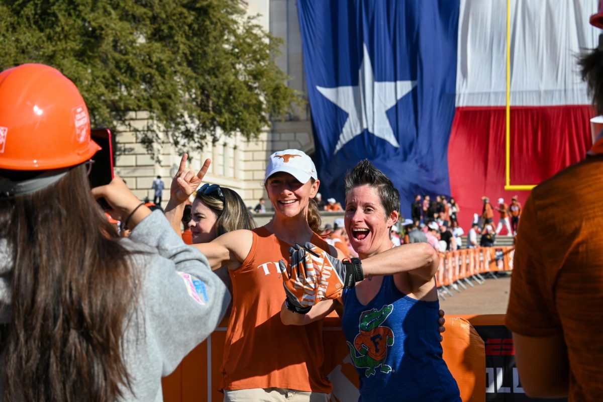 People posing in front of the field goal set up after the College GameDay field goal contest on Oct. 19, 2024.
