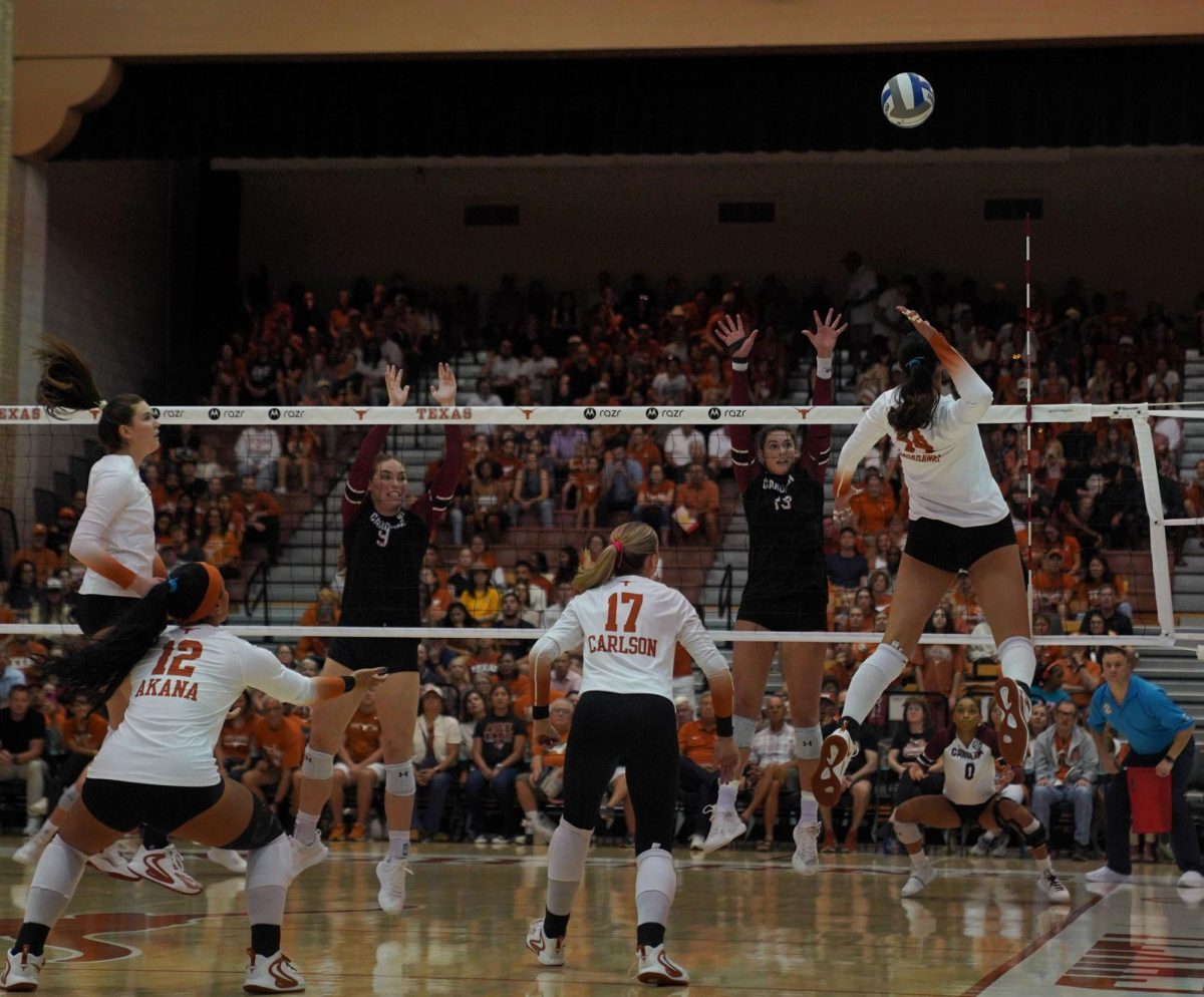 Junior outside hitter, Devin Kahahawai gets a kill during the first set against South Carolina on Oct. 2, 2024. The Longhorns completed a sweep against the Gamecocks in their first ever SEC home game.