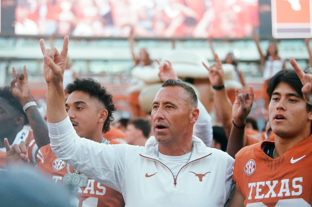 Texas Head Coach Steve Sarkisian sings the Eyes of Texas after the Longhorns' win against Mississippi State on Sept. 28, 2024.