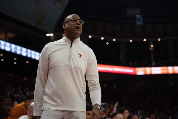 Head basketball coach Rodney Terry yells at his players during Texas' game against OSU on March 2. 