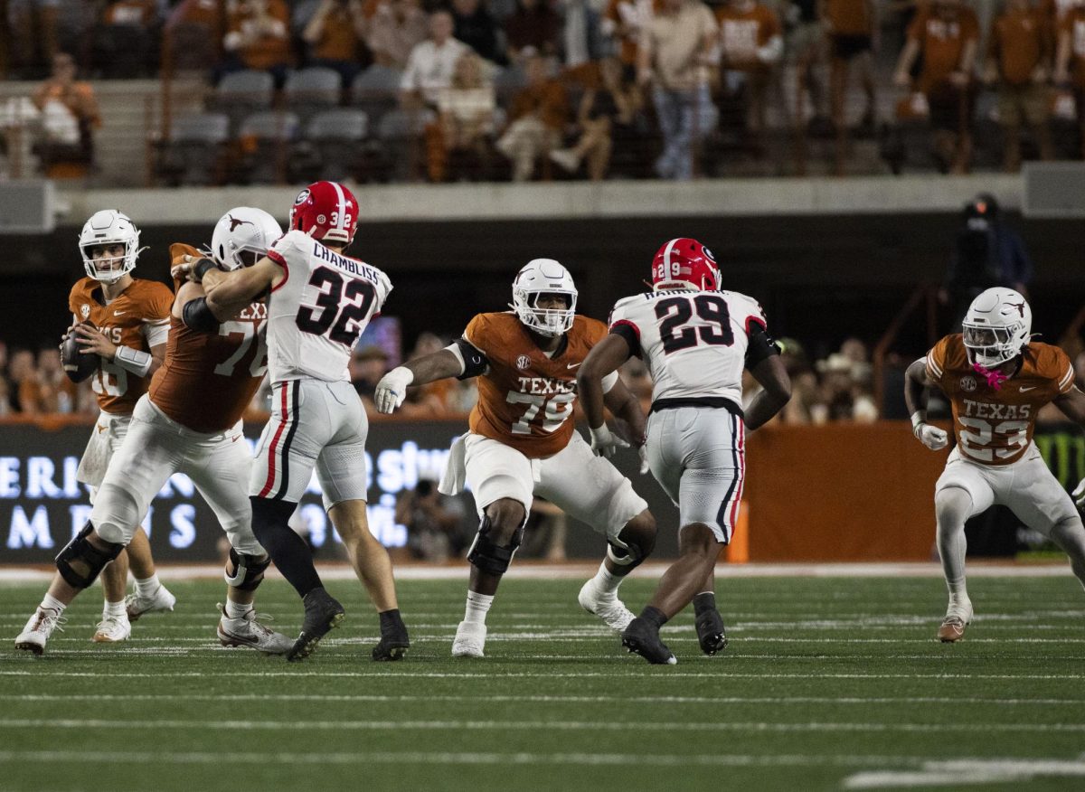 Offensive Lineman Kelvin Banks Jr. prevents Arch Manning from a sack during Texas' game against Georgia on Oct. 19, 2024. 