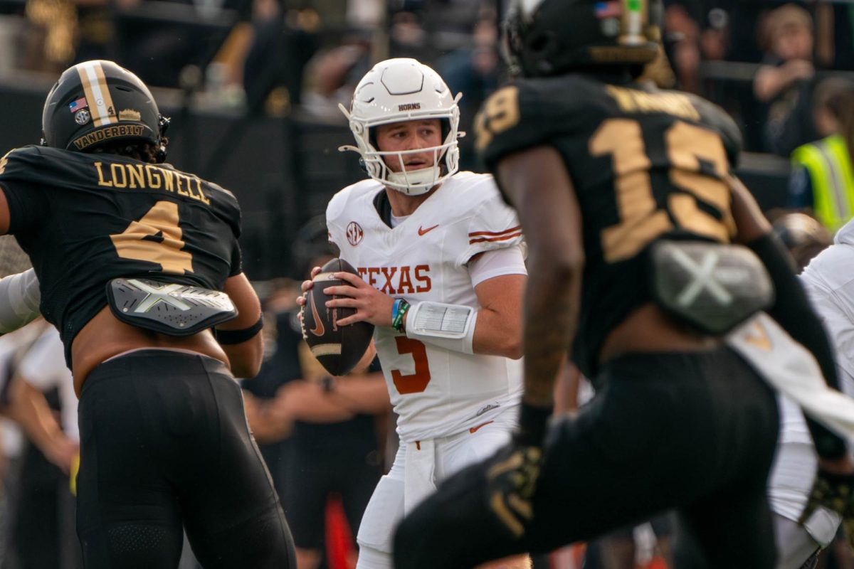 Quarterback Quinn Ewers looks for a receiver to pass to during Texas' game against Vanderbilt on Oct. 26, 2024.