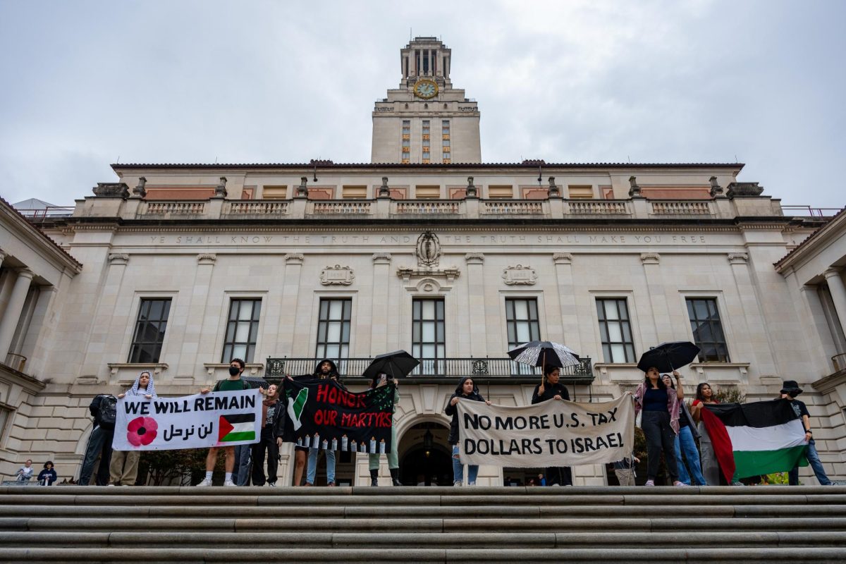 Protesters march to the UT Tower during the Palestine Solidarity walkout on Nov. 9, 2023. They chanted for acknowledgment of Palestinian, Muslim and Arab students and a divestment from weapon investment.