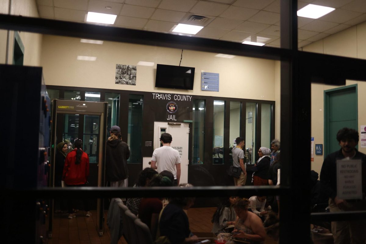 People gather at Travis County Jail where protesters were detained after they were arrested on the University of Texas campus on April 24, 2024.