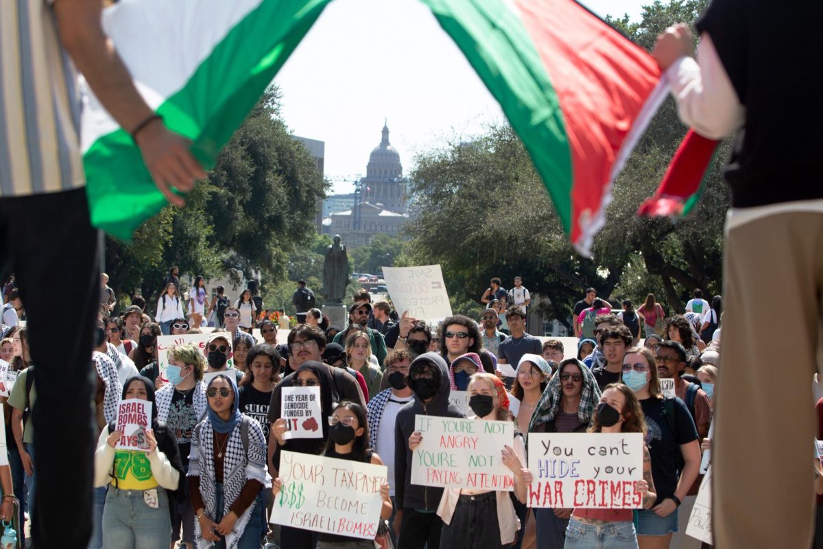 Students gather in front of the UT Tower following a Palestine Solidarity Committee-led walkout on Thursday, Oct. 10, 2024.