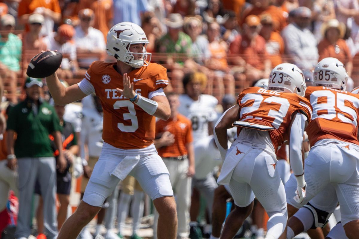 Starting quarterback Quinn Ewers prepares to throw a pass during Texas' game against CSU on Aug. 31.