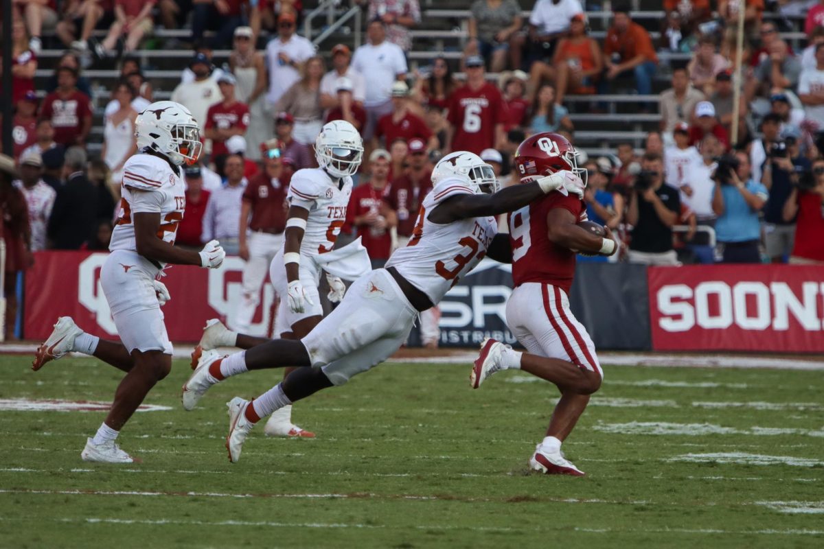 Linebacker David Gbenda sacks Oklahoma quarterback Michael Hawkins Jr. on Oct. 12, 2024.