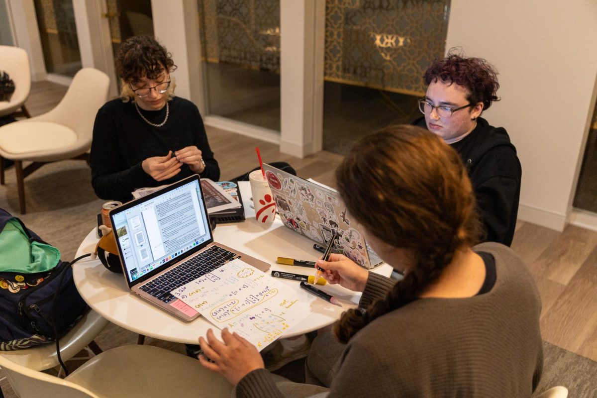 Students work during a “quiet time” session at the Music to Draw To event at the Kendra Scott Center in the Doty Fine Arts Building on Nov. 1, 2024.