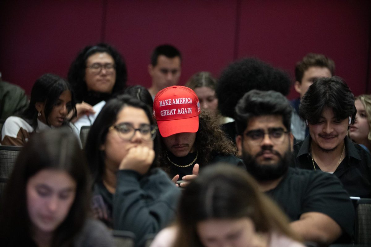 A student wears a Make America Great Again hat inside the DMC on Nov. 5, 2024.