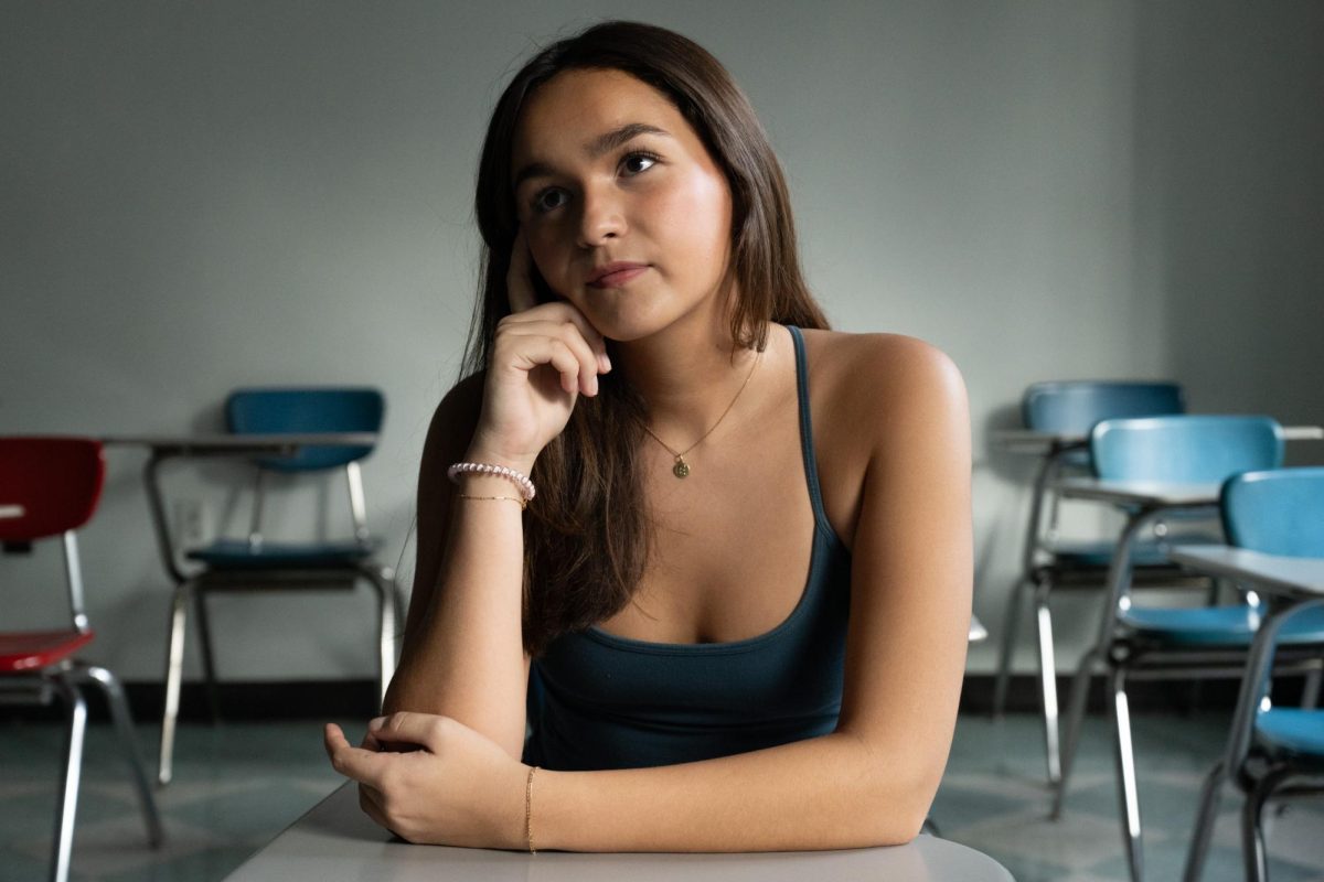 Sophomore advertising student Enid Francis poses for a portrait in Parlin Hall Sunday, Nov. 10, 2024. 