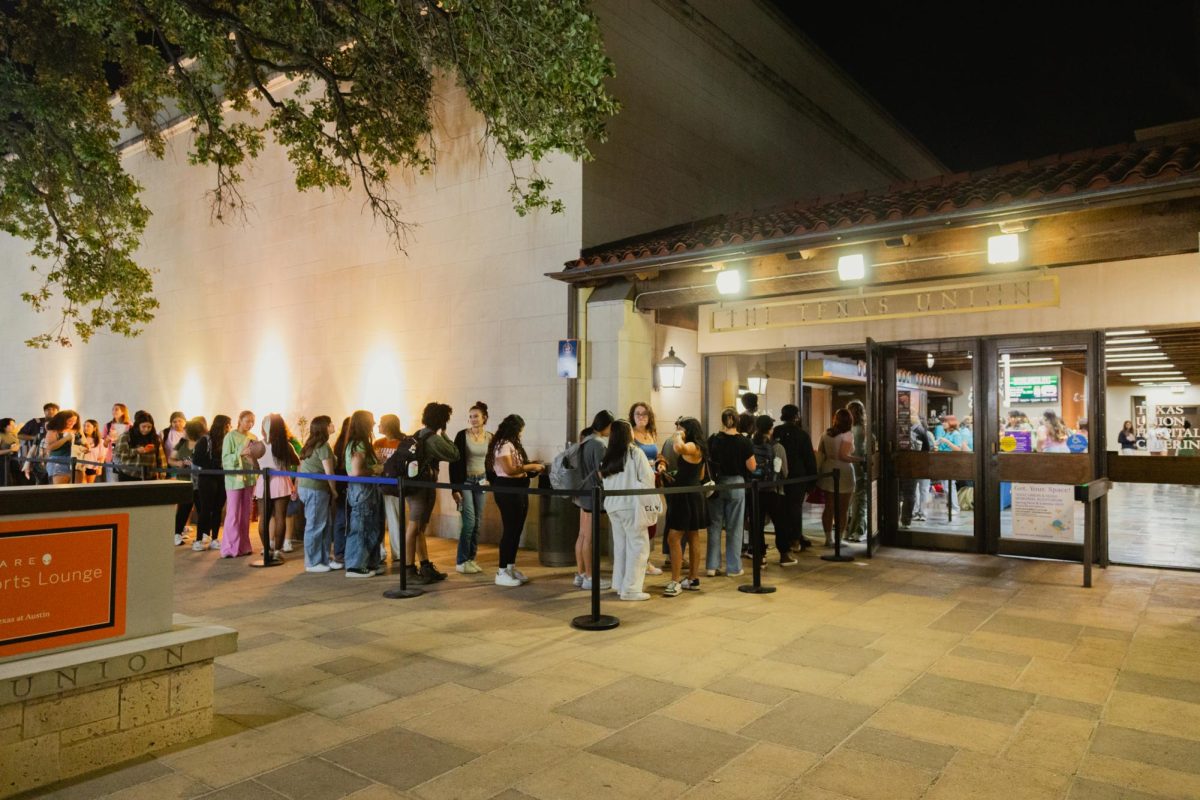 Students enter the theater for the pre-screening of Wicked at the University of Texas at Austin Student Union on November 11, 2024.