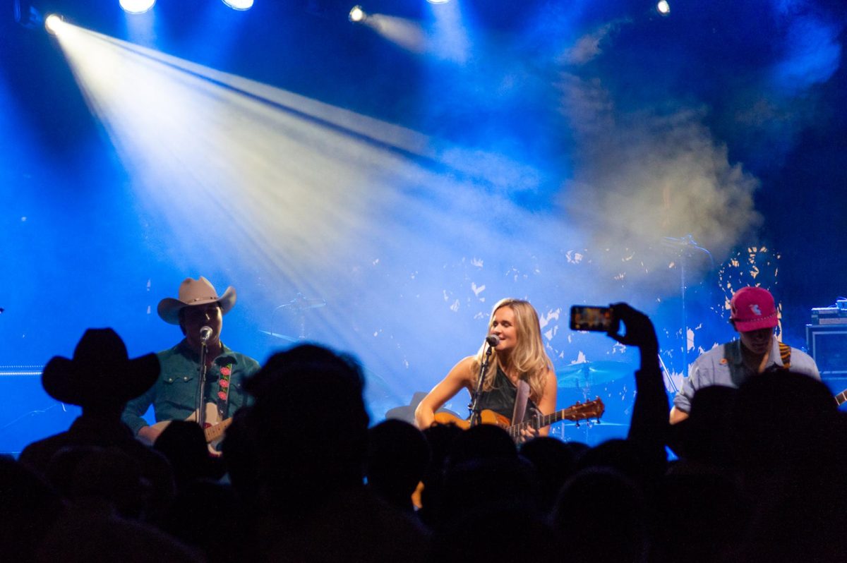 June Shine band performs at the Harvest Moon Festival hosted by the Texas Cowboys on Nov. 14, 2024. Held at Republic Square Park, the event included a concert, raffle, and silent auction with proceeds being donated to UT Elementary.