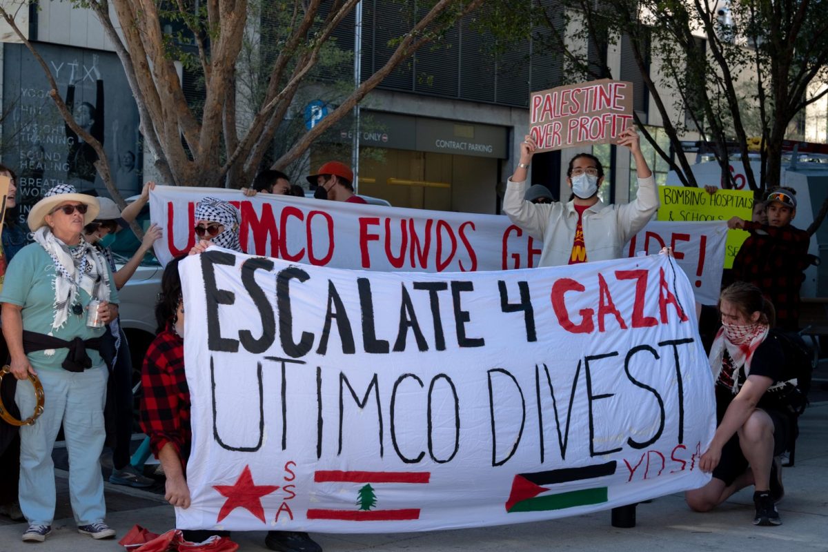 Approximately 50 demonstrators gathered near the University of Texas system building to protest corporations contributing to the ongoing war in Gaza at the quarterly Board of Regents meeting where Arshia Papari was initially supposed to speak but was denied a slot after he could not talk about the designated topics on Nov. 20, 2024.