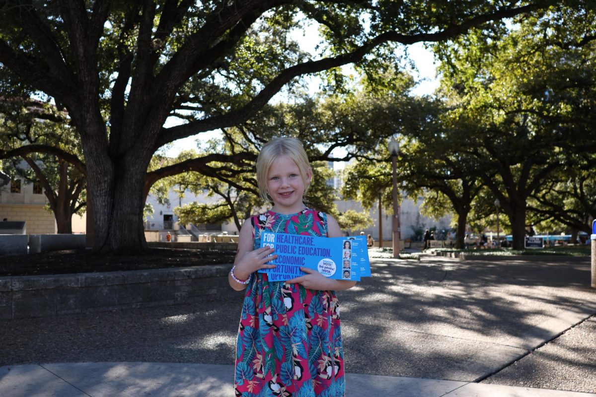 Maeve McGuinness handed out political pamphlets to students in front of the Texas Union on November 5, 2024.